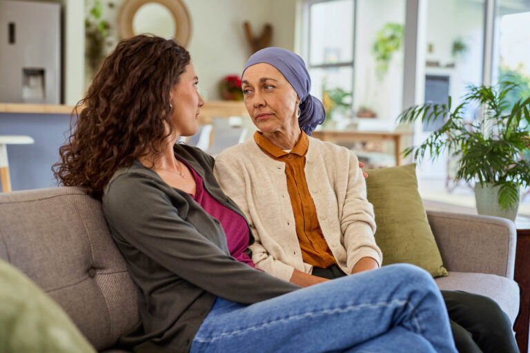 Solentra Wellness | Daughter and mature sad woman suffering from cancer