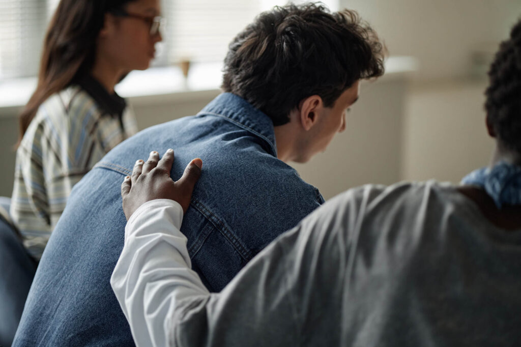 Solentra Wellness | Diverse Teenagers Supporting Each Other during Counseling Session Indoors